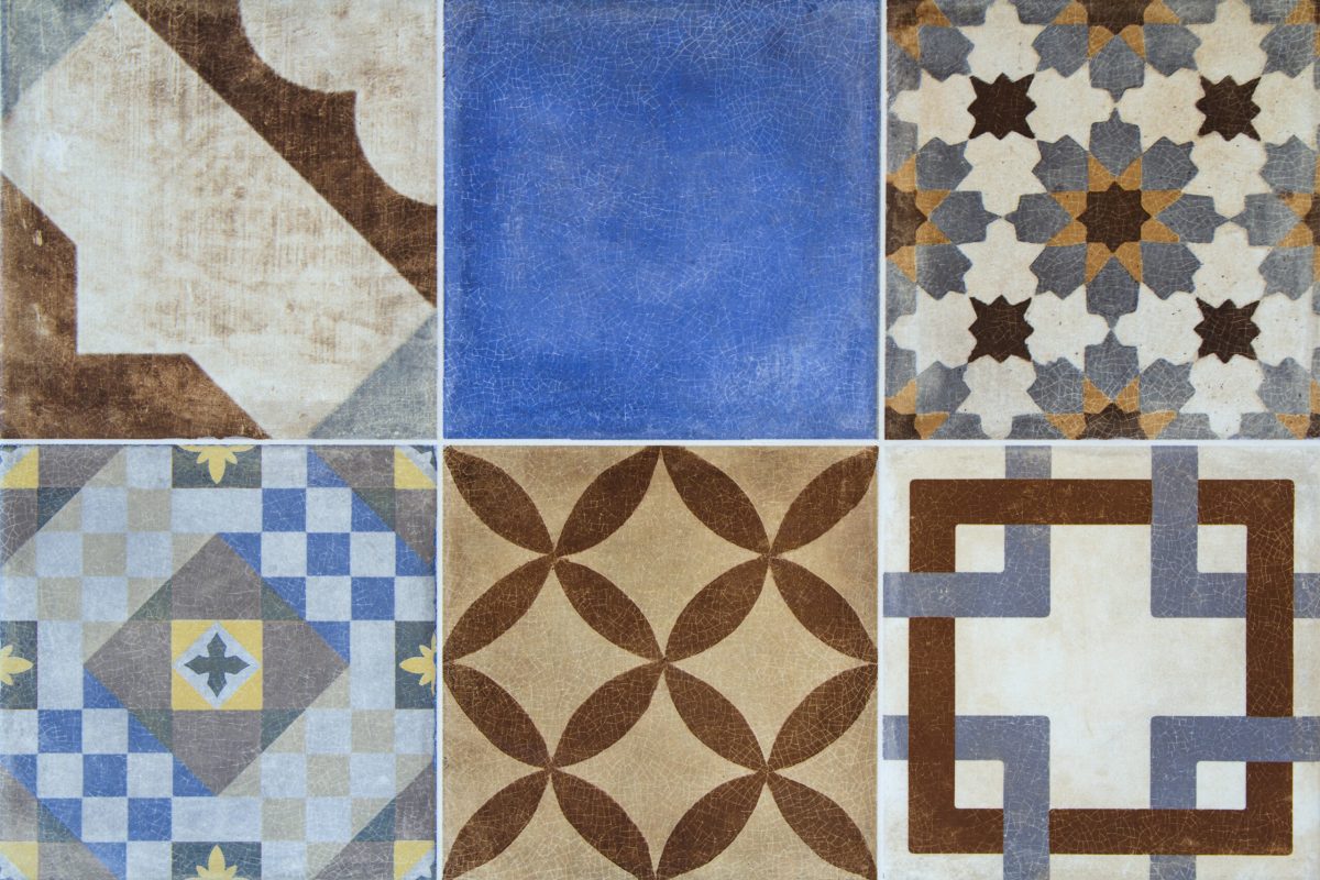 Colorful ceramic tiles with Portugal mediterranean style pattern background.